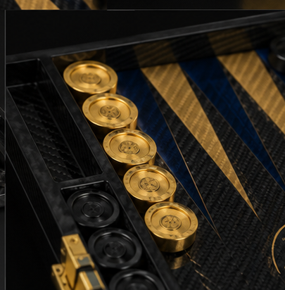 Close-up of black and gold checkers on the Lion of Zion backgammon board